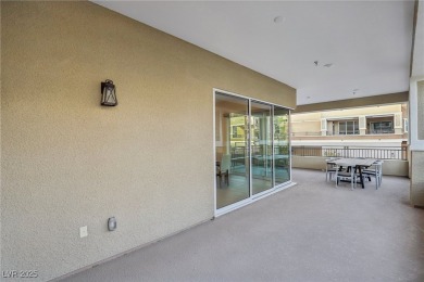 Experience resort-style elegance in this exquisite second-floor on Badlands Golf Club in Nevada - for sale on GolfHomes.com, golf home, golf lot
