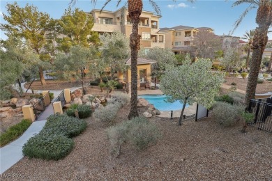 Experience resort-style elegance in this exquisite second-floor on Badlands Golf Club in Nevada - for sale on GolfHomes.com, golf home, golf lot