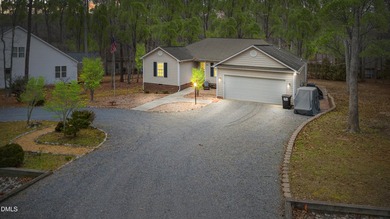 Welcome to 6068 Jones Circle in Carolina Trace, a gated golf on Carolina Trace Country Club in North Carolina - for sale on GolfHomes.com, golf home, golf lot