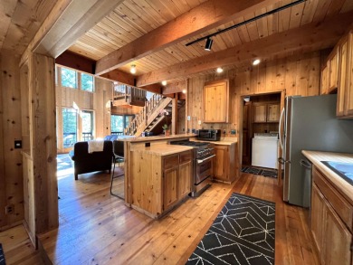 Welcome to your dream mountain escape! This stunning three-level on Lake Almanor West Golf Course in California - for sale on GolfHomes.com, golf home, golf lot