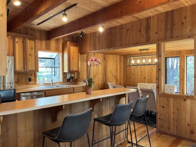 Welcome to your dream mountain escape! This stunning three-level on Lake Almanor West Golf Course in California - for sale on GolfHomes.com, golf home, golf lot
