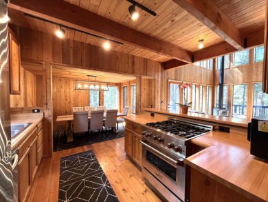 Welcome to your dream mountain escape! This stunning three-level on Lake Almanor West Golf Course in California - for sale on GolfHomes.com, golf home, golf lot