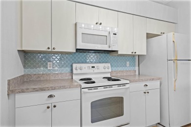 Under contract-accepting backup offers. FOR SALE - 2 Bedroom/2 on Cypresswood Golf and Country Club in Florida - for sale on GolfHomes.com, golf home, golf lot
