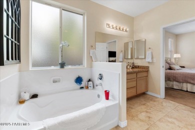 This beautifully updated 4-bedroom, 3-bathroom home in the on StoneRidge Golf Course in Arizona - for sale on GolfHomes.com, golf home, golf lot