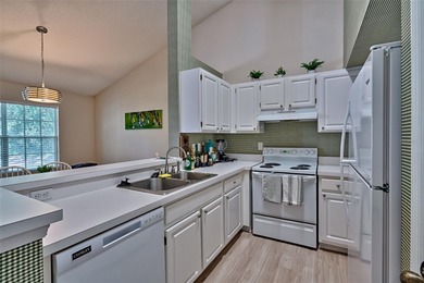 This spacious 2-bedroom, 2-bath condo offers a serene on Haile Plantation Golf and Country Club in Florida - for sale on GolfHomes.com, golf home, golf lot