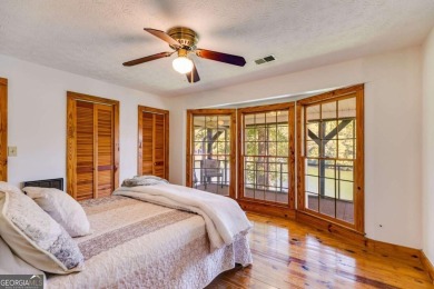 Stunning lake views in a gated community. This beautiful 3 on Fairfield Plantation Golf and Country Club in Georgia - for sale on GolfHomes.com, golf home, golf lot