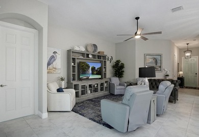 Beautifully appointed 2/2/2 home with a large den that can on Meadowood Golf and Tennis Club in Florida - for sale on GolfHomes.com, golf home, golf lot