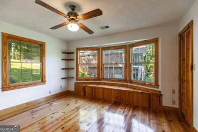 Stunning lake views in a gated community. This beautiful 3 on Fairfield Plantation Golf and Country Club in Georgia - for sale on GolfHomes.com, golf home, golf lot