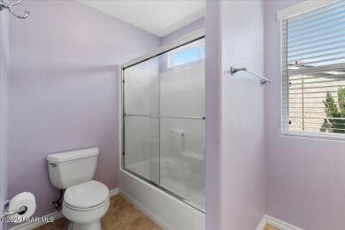 This beautifully updated 4-bedroom, 3-bathroom home in the on StoneRidge Golf Course in Arizona - for sale on GolfHomes.com, golf home, golf lot