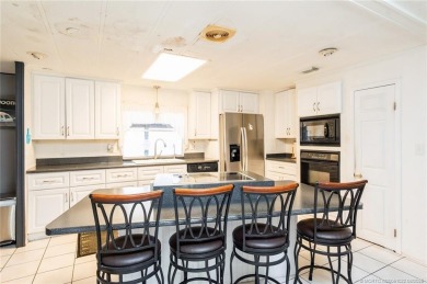 Very spacious two bedroom, two bath manufactured home in on Heritage Ridge Golf Club in Florida - for sale on GolfHomes.com, golf home, golf lot