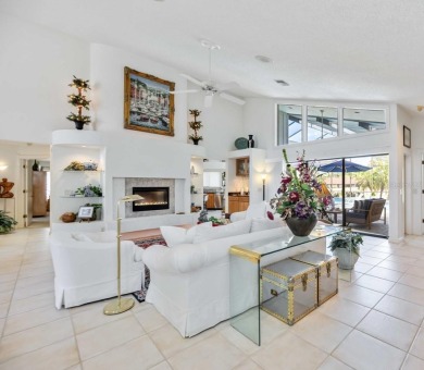 CUSTOM DESIGNED BY DON TRAURIG . . . FAIRWAY VIEWS OF 5TH HOLE on University Park Country Club in Florida - for sale on GolfHomes.com, golf home, golf lot