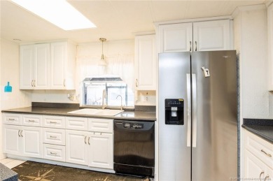 Very spacious two bedroom, two bath manufactured home in on Heritage Ridge Golf Club in Florida - for sale on GolfHomes.com, golf home, golf lot