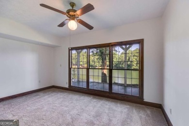 Stunning lake views in a gated community. This beautiful 3 on Fairfield Plantation Golf and Country Club in Georgia - for sale on GolfHomes.com, golf home, golf lot
