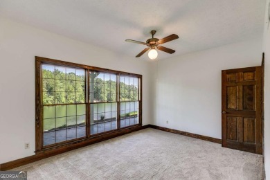 Stunning lake views in a gated community. This beautiful 3 on Fairfield Plantation Golf and Country Club in Georgia - for sale on GolfHomes.com, golf home, golf lot