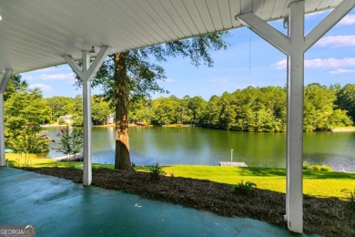 Stunning lake views in a gated community. This beautiful 3 on Fairfield Plantation Golf and Country Club in Georgia - for sale on GolfHomes.com, golf home, golf lot