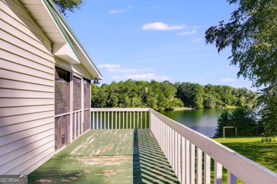 Stunning lake views in a gated community. This beautiful 3 on Fairfield Plantation Golf and Country Club in Georgia - for sale on GolfHomes.com, golf home, golf lot