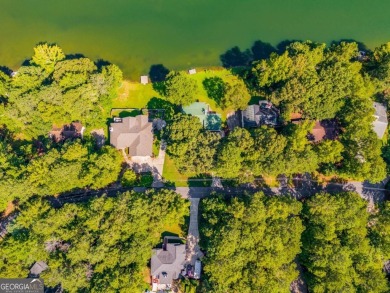 Stunning lake views in a gated community. This beautiful 3 on Fairfield Plantation Golf and Country Club in Georgia - for sale on GolfHomes.com, golf home, golf lot