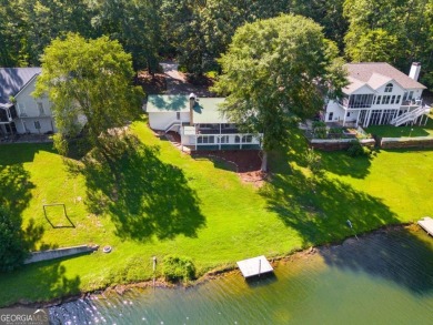 Stunning lake views in a gated community. This beautiful 3 on Fairfield Plantation Golf and Country Club in Georgia - for sale on GolfHomes.com, golf home, golf lot