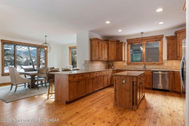 This well-designed Lupine model features an open-concept kitchen on Teton Springs Resort and Club in Idaho - for sale on GolfHomes.com, golf home, golf lot