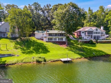 Stunning lake views in a gated community. This beautiful 3 on Fairfield Plantation Golf and Country Club in Georgia - for sale on GolfHomes.com, golf home, golf lot
