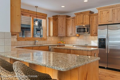 This well-designed Lupine model features an open-concept kitchen on Teton Springs Resort and Club in Idaho - for sale on GolfHomes.com, golf home, golf lot