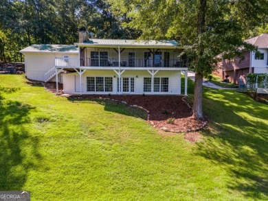 Stunning lake views in a gated community. This beautiful 3 on Fairfield Plantation Golf and Country Club in Georgia - for sale on GolfHomes.com, golf home, golf lot