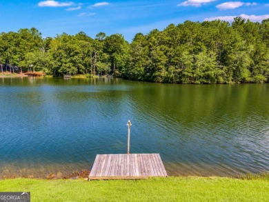 Stunning lake views in a gated community. This beautiful 3 on Fairfield Plantation Golf and Country Club in Georgia - for sale on GolfHomes.com, golf home, golf lot