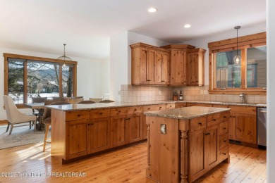 This well-designed Lupine model features an open-concept kitchen on Teton Springs Resort and Club in Idaho - for sale on GolfHomes.com, golf home, golf lot
