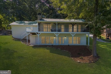 Stunning lake views in a gated community. This beautiful 3 on Fairfield Plantation Golf and Country Club in Georgia - for sale on GolfHomes.com, golf home, golf lot