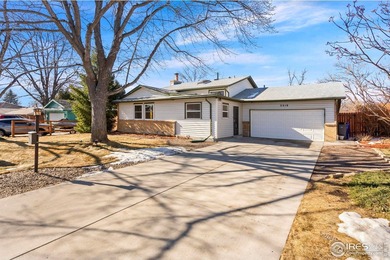 Located on a quiet street in the heart of Loveland, this home on The Olde Course At Loveland in Colorado - for sale on GolfHomes.com, golf home, golf lot