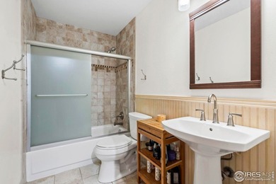 Located on a quiet street in the heart of Loveland, this home on The Olde Course At Loveland in Colorado - for sale on GolfHomes.com, golf home, golf lot