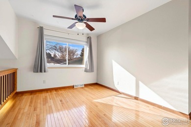 Located on a quiet street in the heart of Loveland, this home on The Olde Course At Loveland in Colorado - for sale on GolfHomes.com, golf home, golf lot