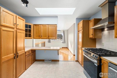 Located on a quiet street in the heart of Loveland, this home on The Olde Course At Loveland in Colorado - for sale on GolfHomes.com, golf home, golf lot