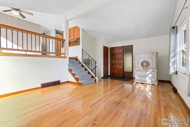 Located on a quiet street in the heart of Loveland, this home on The Olde Course At Loveland in Colorado - for sale on GolfHomes.com, golf home, golf lot