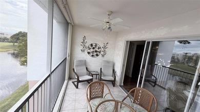 This condo is located in the prestigious *The Island* section of on Sunrise Lakes Phase IV Golf Course in Florida - for sale on GolfHomes.com, golf home, golf lot