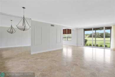 Ground Floor King Unit on Beautiful Oaks Way! This 3 Bedroom 2 on Palm-Aire Country Club and Resort - The Oaks in Florida - for sale on GolfHomes.com, golf home, golf lot