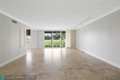 Ground Floor King Unit on Beautiful Oaks Way! This 3 Bedroom 2 on Palm-Aire Country Club and Resort - The Oaks in Florida - for sale on GolfHomes.com, golf home, golf lot