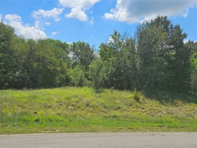 Escape to the tranquility of this enchanting half-acre woodland on The Retreat in Texas - for sale on GolfHomes.com, golf home, golf lot