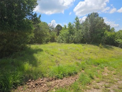 Escape to the tranquility of this enchanting half-acre woodland on The Retreat in Texas - for sale on GolfHomes.com, golf home, golf lot