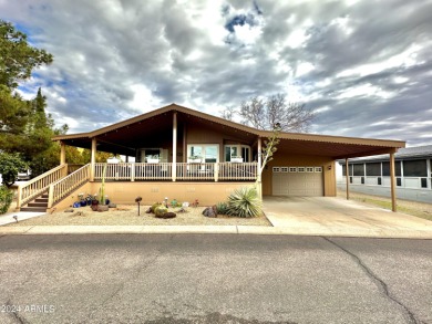 Stunning 1850 Sqft Home With Garage! Don't miss this one! 2016 on Paradise Peak Golf Course in Arizona - for sale on GolfHomes.com, golf home, golf lot