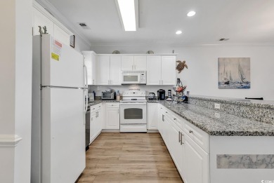 This elegant condo and well positioned maintenance free coastal on Myrtlewood Golf Course and Club  in South Carolina - for sale on GolfHomes.com, golf home, golf lot