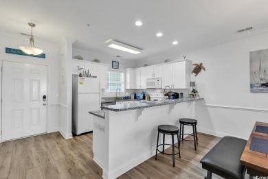 This elegant condo and well positioned maintenance free coastal on Myrtlewood Golf Course and Club  in South Carolina - for sale on GolfHomes.com, golf home, golf lot