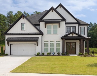 Welcome home to this executive home built by the Toll Brothers on Capital City Club Crabapple in Georgia - for sale on GolfHomes.com, golf home, golf lot
