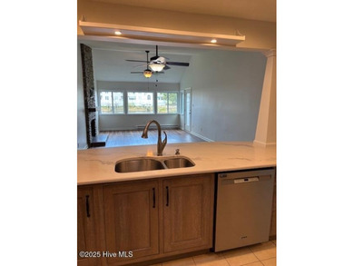 Discover this stunning 3-bedroom, 3-bath townhouse with a 2-car on Woodlake Country Club in North Carolina - for sale on GolfHomes.com, golf home, golf lot