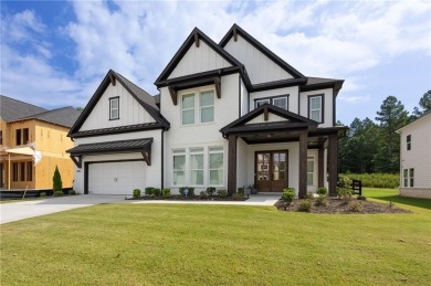 Welcome home to this executive home built by the Toll Brothers on Capital City Club Crabapple in Georgia - for sale on GolfHomes.com, golf home, golf lot