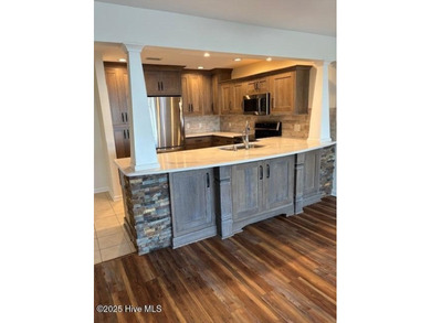 Discover this stunning 3-bedroom, 3-bath townhouse with a 2-car on Woodlake Country Club in North Carolina - for sale on GolfHomes.com, golf home, golf lot