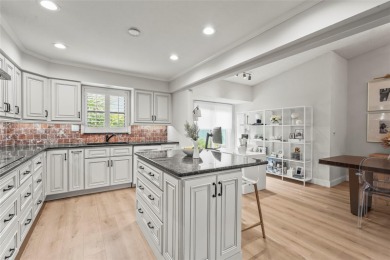 Enjoy the ease of maintenance-free living in the highly on Palm Aire Country Club of Sarasota in Florida - for sale on GolfHomes.com, golf home, golf lot