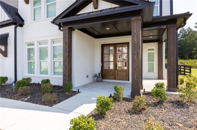 Welcome home to this executive home built by the Toll Brothers on Capital City Club Crabapple in Georgia - for sale on GolfHomes.com, golf home, golf lot