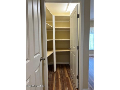 Discover this stunning 3-bedroom, 3-bath townhouse with a 2-car on Woodlake Country Club in North Carolina - for sale on GolfHomes.com, golf home, golf lot