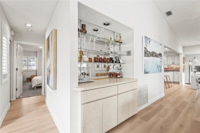 Enjoy the ease of maintenance-free living in the highly on Palm Aire Country Club of Sarasota in Florida - for sale on GolfHomes.com, golf home, golf lot